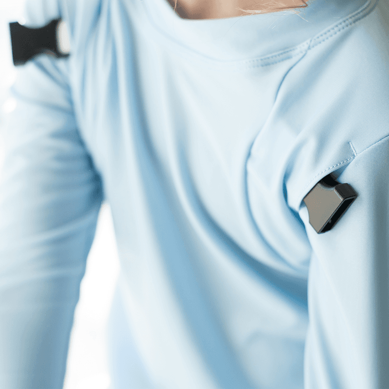 SR buckle on shirt